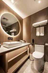 Koupelna v ubytování Jian Guo Hotel Yantai Phoenix Building