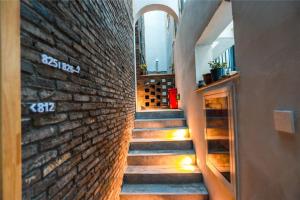 Зображення з фотогалереї помешкання Huangliang Yimeng Designer Hotel Wuzhen Xizha Scenic Area Branch у місті Tongxiang