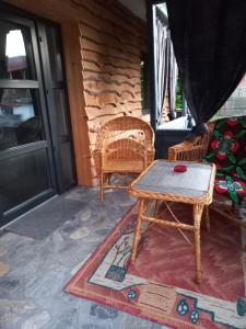 Posezení v ubytování CĂSUȚA BUNICII CU PRISPĂ