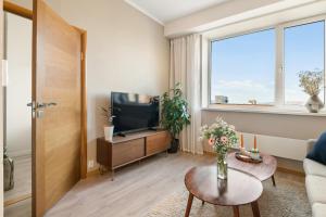 Μια τηλεόραση ή/και κέντρο ψυχαγωγίας στο 3-roms leilighet i hjertet av Sandviken