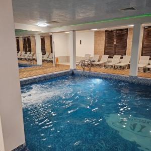 Bazén v ubytování Green life Ski & Spa Studio nebo v jeho okolí