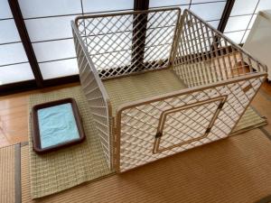 A bed or beds in a room at Kawaguchi Onsen Ousanso