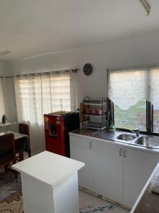 Kuchyň nebo kuchyňský kout v ubytování Happy staycation