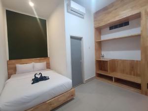 Voodi või voodid majutusasutuse D'Hills Hotel toas