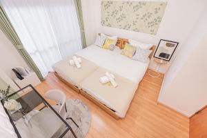Una cama o camas en una habitación de Jone叙園商店街近隣駅徒步5分 新宿12分