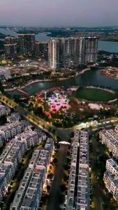 an aerial view of a city with buildings and a harbor at Khu đô thị Vinhomes Grand Park Tp Thủ đức Tp HCM in Long Bình