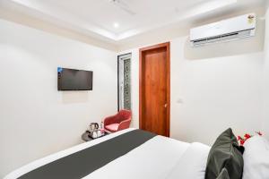 TV a/nebo společenská místnost v ubytování Hotel O Ivory Inn