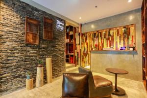 Зона вітальні в Huangliang Yimeng Designer Hotel Wuzhen Xizha Scenic Area Branch