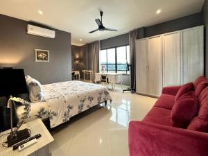 Кровать или кровати в номере Klong Muang Beach Apartment