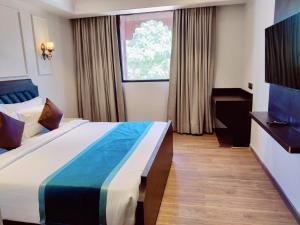 Μια τηλεόραση ή/και κέντρο ψυχαγωγίας στο Heena Heritage Resort