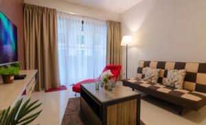 Μια τηλεόραση ή/και κέντρο ψυχαγωγίας στο Relaxing High-Floor Stay at Suasana Suites JB