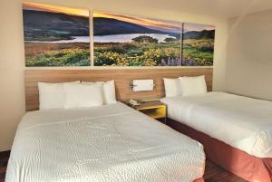 Postel nebo postele na pokoji v ubytování Days Inn by Wyndham Lumberton