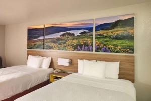 Postel nebo postele na pokoji v ubytování Days Inn by Wyndham Lumberton