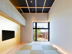 TV a/nebo společenská místnost v ubytování 大日寺の宿 京都吉祥院