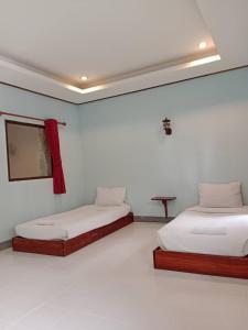 Postel nebo postele na pokoji v ubytování Chill Chill resort