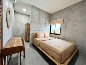 Postel nebo postele na pokoji v ubytování Rattanhaus Premiere