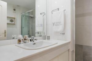 Koupelna v ubytování Espacioso y encantador apartamento en las gaviotas