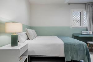 Postel nebo postele na pokoji v ubytování Espacioso y encantador apartamento en las gaviotas