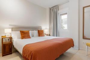 Postel nebo postele na pokoji v ubytování Espacioso y encantador apartamento en las gaviotas