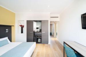 Posteľ alebo postele v izbe v ubytovaní Hotel Alimara