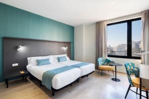 Posteľ alebo postele v izbe v ubytovaní Hotel Alimara