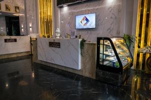 TV a/nebo společenská místnost v ubytování Mirnian Hotel