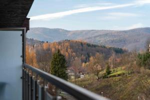 a balcony with a view of a mountain at Kurort Kozubnik Daglezja - Apartamenty Dream Apart in Porąbka