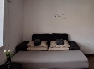 Postel nebo postele na pokoji v ubytování Maestro I.