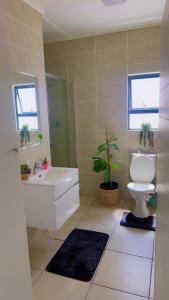 Ένα μπάνιο στο The Reid Lifestyle Estate