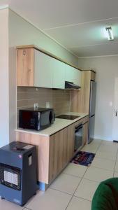 Η κουζίνα ή μικρή κουζίνα στο The Reid Lifestyle Estate