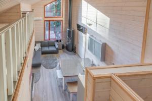 an overhead view of the living room of a tiny house at Holiday Apartments Kruunurinne 1 & 2 in Himos
