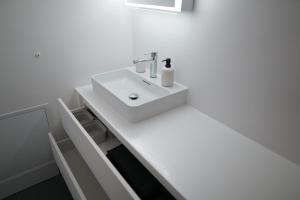 Koupelna v ubytování Modern Bijou Bern + 24 fotografií