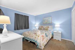 Postel nebo postele na pokoji v ubytování Myrtle Beach Resort A349 + 33 fotografií