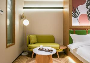 Letto o letti in una camera di Xiamen Airport SM City Plaza Yunrui Hotel