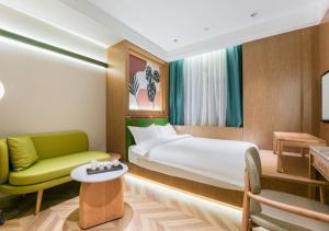 Letto o letti in una camera di Xiamen Airport SM City Plaza Yunrui Hotel