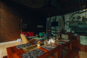 a living room with a couch and a table at Teteng's Apartelle in San Vicente