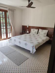 Katil atau katil-katil dalam bilik di The Villa Mandrem