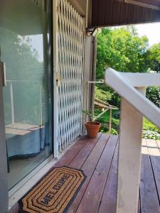 Balkón nebo terasa v ubytování AtTheDeck