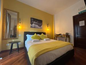 Voodi või voodid majutusasutuse Vatican QG Rooms toas