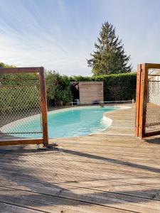 Bazén v ubytování Villa Familiale avec Piscine Privée nebo v jeho okolí