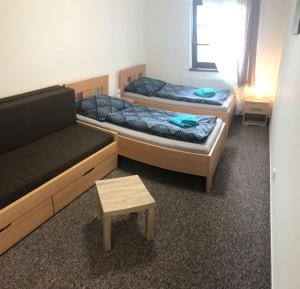 Postel nebo postele na pokoji v ubytování Park Penzion