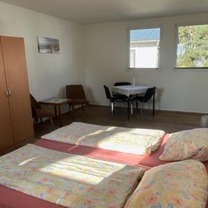Ένα ή περισσότερα κρεβάτια σε δωμάτιο στο Ein Raum Apartment A