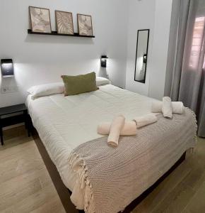 Ένα ή περισσότερα κρεβάτια σε δωμάτιο στο Los Mellis - María Zambrano Estación de Tren & Bus