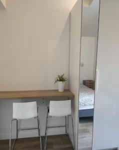 Postel nebo postele na pokoji v ubytování Suite La Ramée
