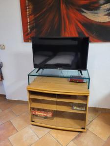 Μια τηλεόραση ή/και κέντρο ψυχαγωγίας στο Ferienhaus BO