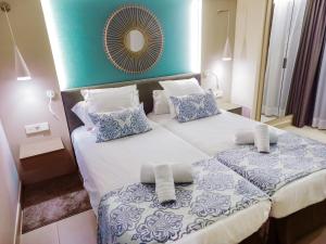 Posteľ alebo postele v izbe v ubytovaní Feelathome Tortuga de Mar
