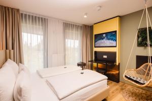 Rioca Frankfurt Posto 7客房内的一张或多张床位