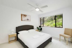 Giường trong phòng chung tại Waterfront Escape +21 ảnh