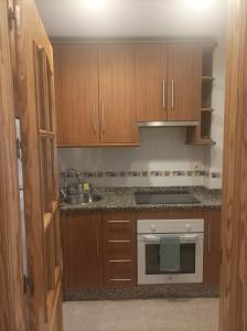 Η κουζίνα ή μικρή κουζίνα στο APARTAMENTO1 dormitorio