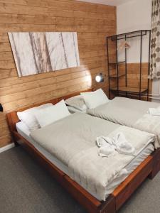 Postel nebo postele na pokoji v ubytování Propaganda Chalet